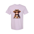 Dixie Magnolia Market light purple graphic tee with a cute Highland cow wearing a leopard print bow and bandana, holding an iced coffee.